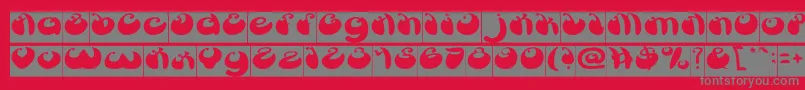 フォントButterflyInverse – 赤い背景に灰色の文字
