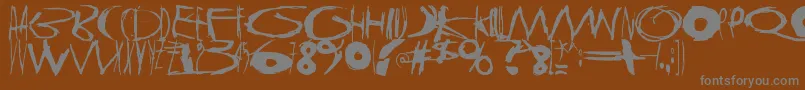 TasapainoaistiHuimaus Font – Gray Fonts on Brown Background