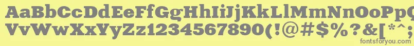 Aardvark-fontti – harmaat kirjasimet keltaisella taustalla