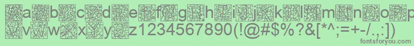 IronglassDropcaps Font – Gray Fonts on Green Background