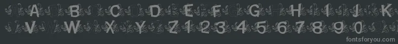 MtfBaseLeafy-Schriftart – Graue Schriften auf schwarzem Hintergrund