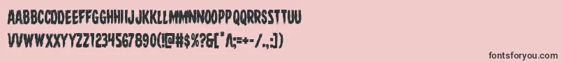 フォントDirewolfcond – ピンクの背景に黒い文字