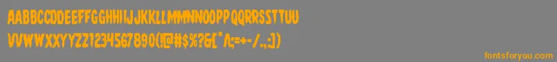 フォントDirewolfcond – オレンジの文字は灰色の背景にあります。