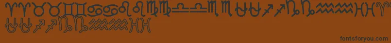 Шрифт ZodiacSt – чёрные шрифты на коричневом фоне