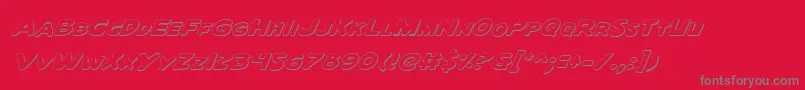 Czcionka QuartermainOutlineItalic – szare czcionki na czerwonym tle