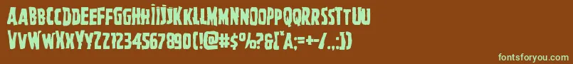 Ghoulishintentmangle-fontti – vihreät fontit ruskealla taustalla