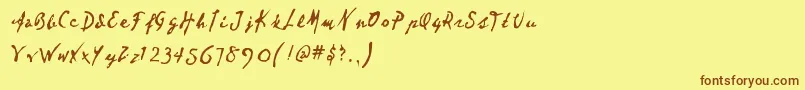 フォントDeartheo – 茶色の文字が黄色の背景にあります。