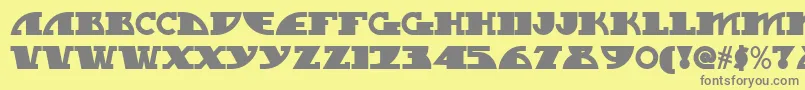 フォントMy Gal Swoopy Nf – 黄色の背景に灰色の文字