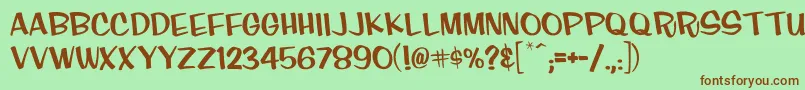 Finkcasual Font – Brown Fonts on Green Background