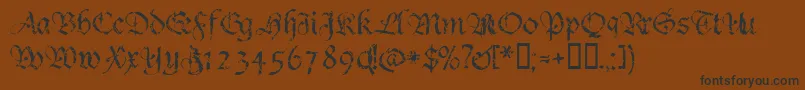 Crumble ffy-Schriftart – Schwarze Schriften auf braunem Hintergrund