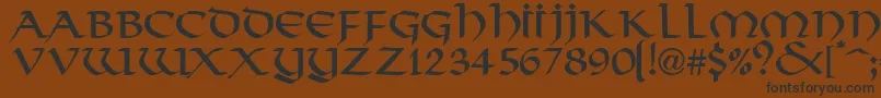 フォントValhallaNormal – 黒い文字が茶色の背景にあります