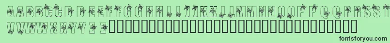 KrButterfly3-Schriftart – Schwarze Schriften auf grünem Hintergrund