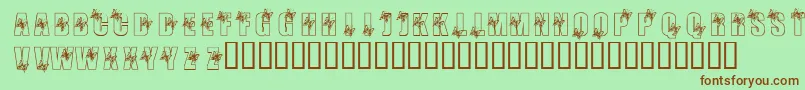 KrButterfly3 Font – Brown Fonts on Green Background