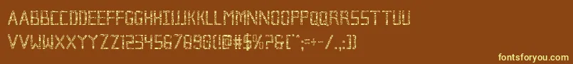 Brokencyborgcond-fontti – keltaiset fontit ruskealla taustalla