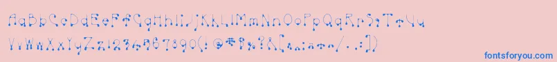 Skinnydrip-Schriftart – Blaue Schriften auf rosa Hintergrund
