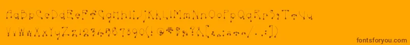 Skinnydrip Font – Brown Fonts on Orange Background