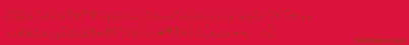 Skinnydrip-Schriftart – Braune Schriften auf rotem Hintergrund