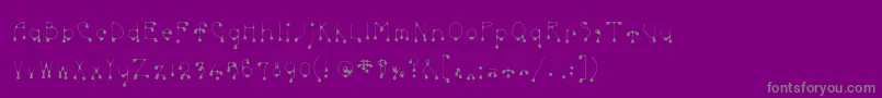 Skinnydrip Font – Gray Fonts on Purple Background