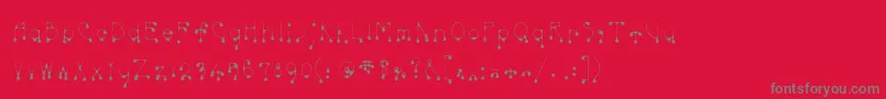 Skinnydrip Font – Gray Fonts on Red Background