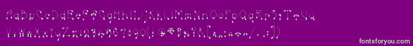 Skinnydrip Font – Green Fonts on Purple Background