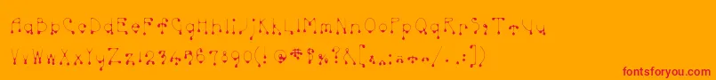 Skinnydrip Font – Red Fonts on Orange Background