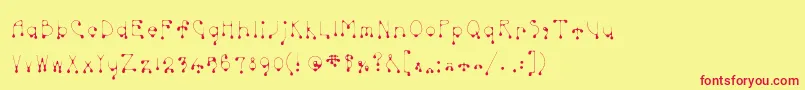 Skinnydrip-Schriftart – Rote Schriften auf gelbem Hintergrund