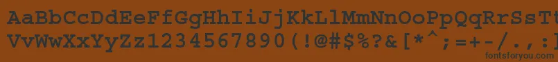 フォントCourierstdBold – 黒い文字が茶色の背景にあります