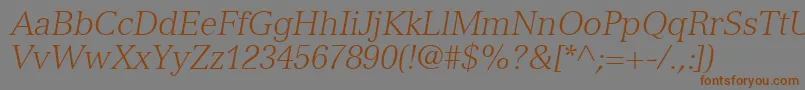 Czcionka NuanceLightSsiLightItalic – brązowe czcionki na szarym tle