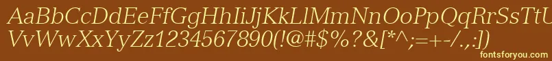 NuanceLightSsiLightItalic-fontti – keltaiset fontit ruskealla taustalla