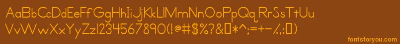 PrimerPrintMedium Font – Orange Fonts on Brown Background