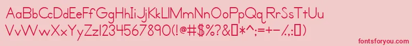 PrimerPrintMedium Font – Red Fonts on Pink Background