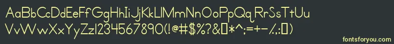 PrimerPrintMedium Font – Yellow Fonts on Black Background