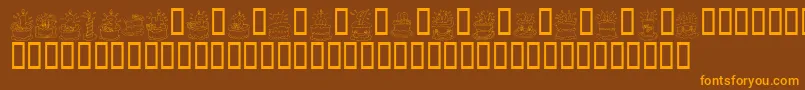 KrBirthdayCakeDings-Schriftart – Orangefarbene Schriften auf braunem Hintergrund