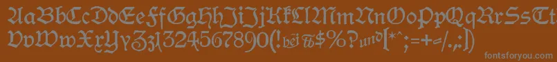 フォントHamburgerSchwabacher – 茶色の背景に灰色の文字