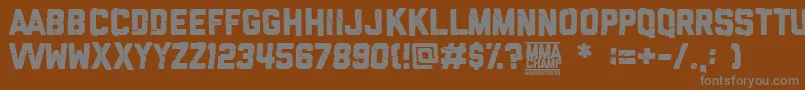 MmaChamp-fontti – harmaat kirjasimet ruskealla taustalla