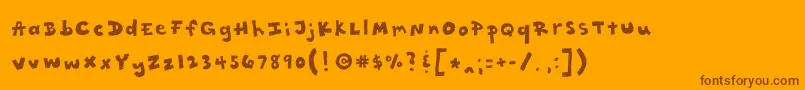 Rattytatty-Schriftart – Braune Schriften auf orangefarbenem Hintergrund