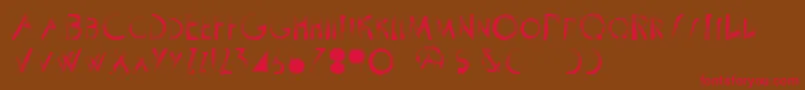 フォントScrapistRegular – 赤い文字が茶色の背景にあります。