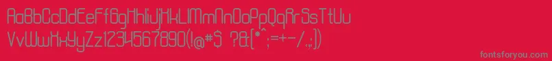 フォントAposiopesisNormal – 赤い背景に灰色の文字