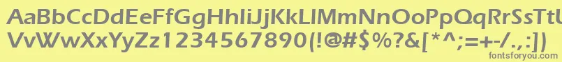 ItcErasLtDemi-fontti – harmaat kirjasimet keltaisella taustalla