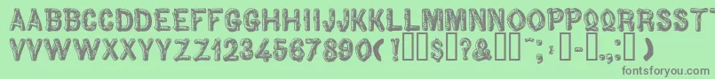 Woodbadge Font – Gray Fonts on Green Background