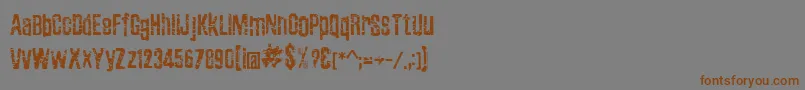 フォントZubajdaGrng – 茶色の文字が灰色の背景にあります。