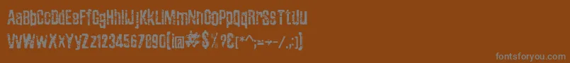 Шрифт ZubajdaGrng – серые шрифты на коричневом фоне