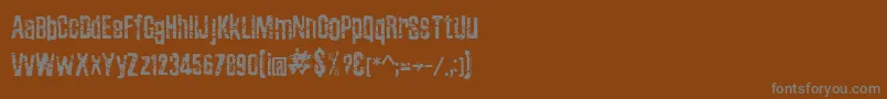 フォントZubajdaGrng – 茶色の背景に灰色の文字