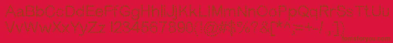 Dotness-fontti – ruskeat fontit punaisella taustalla