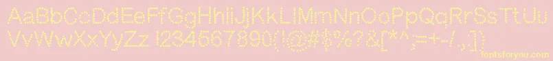 Dotness Font – Yellow Fonts on Pink Background