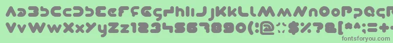 Dominique Font – Gray Fonts on Green Background