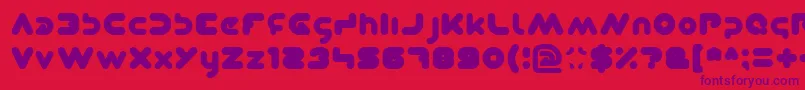 Dominique Font – Purple Fonts on Red Background