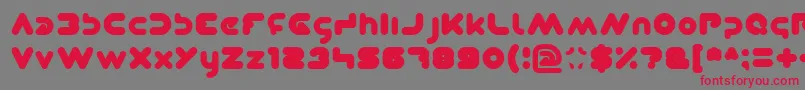 Weitere Informationen zur Dominique-Schriftart Dominique-Schriftart – Rote Schriften auf grauem Hintergrund