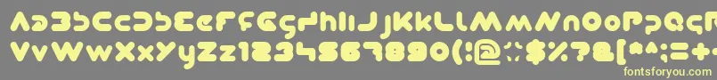 Dominique Font – Yellow Fonts on Gray Background