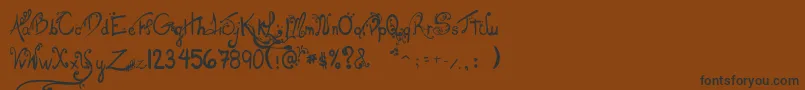LesOeufsDeCassowary Font – Black Fonts on Brown Background